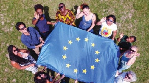 Group of people holding a European flag Group of people holding a European flag