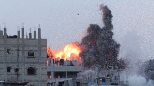 Smoke and flames rise during an Israeli air strike in central Gaza Strip, June 3, 2024. ...