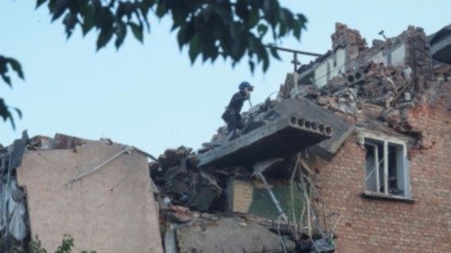 A rescuer works at a site of a residential building hit by a Russian missile strike, amid Russia's ... A rescuer works at a site of a residential building hit by a Russian missile strike, amid Russia's ...