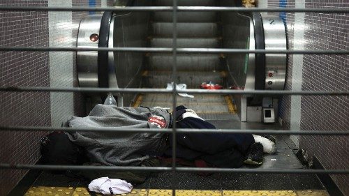 A homeless person sleeps near the escalator of a subway station, in Buenos Aires, Argentina, May 30, ... A homeless person sleeps near the escalator of a subway station, in Buenos Aires, Argentina, May 30, ...