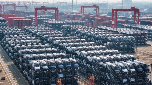 (FILES) BYD electric cars waiting to be loaded onto a ship are seen stacked at the international ... (FILES) BYD electric cars waiting to be loaded onto a ship are seen stacked at the international ...