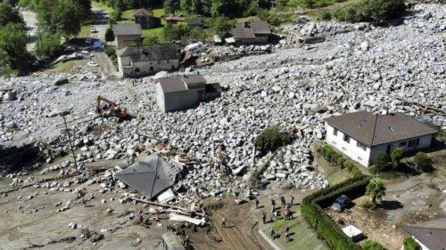 epa11429763 An image taken with a drone shows homes amid debris after a landslide, caused by bad ... epa11429763 An image taken with a drone shows homes amid debris after a landslide, caused by bad ...