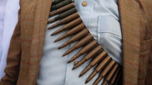 epa11410614 A Houthi supporter wearing a gun bullet belt around his chest takes part in a protest ... epa11410614 A Houthi supporter wearing a gun bullet belt around his chest takes part in a protest ...