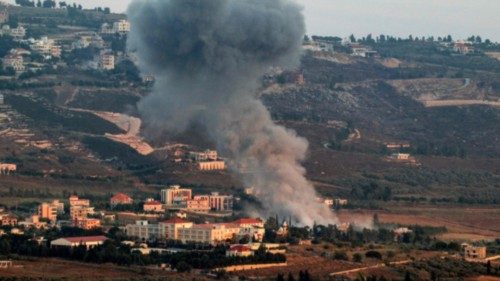 A smoke plume billows during Israeli bombardment on the village of Khiam in south Lebanon near the ... A smoke plume billows during Israeli bombardment on the village of Khiam in south Lebanon near the ...