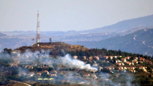 epaselect epa11439957 Smoke billows in the Israeli northern town of Metulla from cross-border ... epaselect epa11439957 Smoke billows in the Israeli northern town of Metulla from cross-border ...