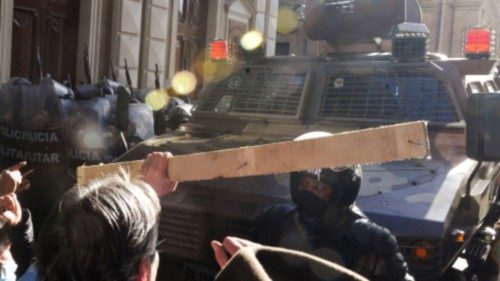 TOPSHOT - Supporters of Bolivian President Luis Arce confront Military police officers at Plaza ... TOPSHOT - Supporters of Bolivian President Luis Arce confront Military police officers at Plaza ...