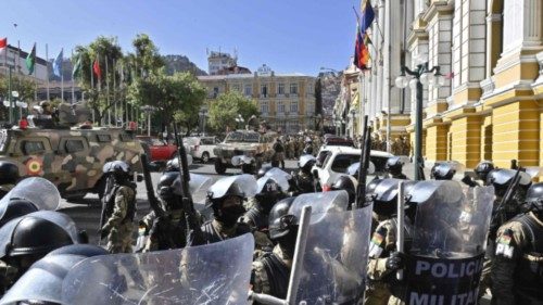 TOPSHOT - Military troops are deployed outside the Quemado Palace at the Plaza Murillo in La Paz on ... TOPSHOT - Military troops are deployed outside the Quemado Palace at the Plaza Murillo in La Paz on ...