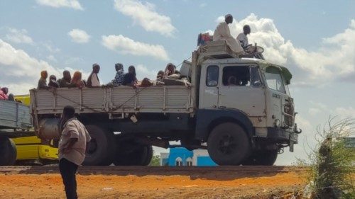 People fleeing the town of Singa, the capital of Sudan's southeastern Sennar state, arrive in ... People fleeing the town of Singa, the capital of Sudan's southeastern Sennar state, arrive in ...