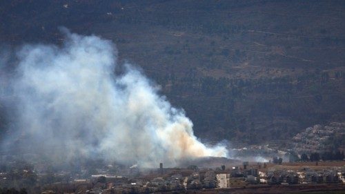 epa11455542 Smoke rises from Kiryat Shmona, northern Israel, as a result of interceptions, 03 July ...
