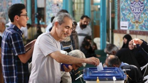 epa11443304 Iranians cast their votes in a polling station during the presidential election, in ... epa11443304 Iranians cast their votes in a polling station during the presidential election, in ...