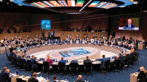 TOPSHOT - US President Joe Biden speaks during the meeting of the North Atlantic Council at the ... TOPSHOT - US President Joe Biden speaks during the meeting of the North Atlantic Council at the ...
