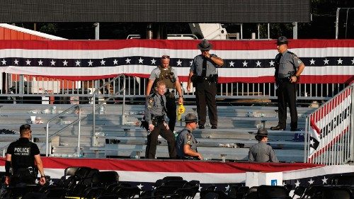 BUTLER, PENNSYLVANIA - JULY 13: Law enforcement agents stand near the stage of a campaign rally for ... BUTLER, PENNSYLVANIA - JULY 13: Law enforcement agents stand near the stage of a campaign rally for ...