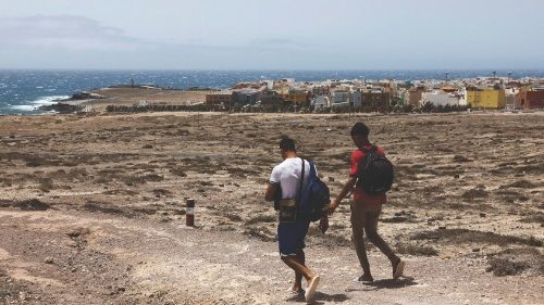 Zakaria Er Rkoiu, 18 years old, and Abdellatif Bouhlal, 18 years old, Moroccan migrants walk towards ... Zakaria Er Rkoiu, 18 years old, and Abdellatif Bouhlal, 18 years old, Moroccan migrants walk towards ...