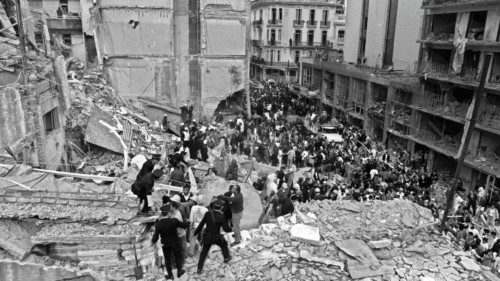 (FILES) Firemen and policemen search for wounded people after a bomb exploded at the Argentinian ... (FILES) Firemen and policemen search for wounded people after a bomb exploded at the Argentinian ...