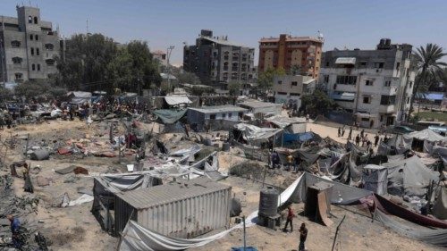 A view of destroyed tents and make shift housing structures following an Israeli military strike on ... A view of destroyed tents and make shift housing structures following an Israeli military strike on ...