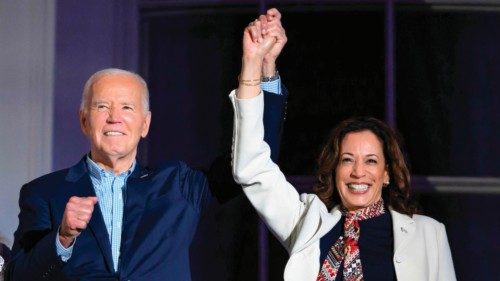 (FILES) US President Joe Biden (L) and US Vice President Kamala Harris hold hands and gesture as ... (FILES) US President Joe Biden (L) and US Vice President Kamala Harris hold hands and gesture as ...