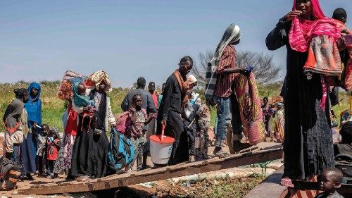 Sudanese refugees and ethnic South Sudanese who have fled the war in Sudan carry their belongings ... Sudanese refugees and ethnic South Sudanese who have fled the war in Sudan carry their belongings ...