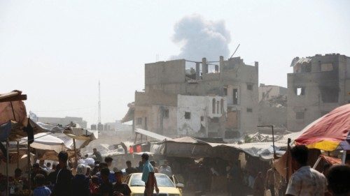 Smoke billows as Palestinians flee the eastern part of Khan Younis to make their way after they were ... Smoke billows as Palestinians flee the eastern part of Khan Younis to make their way after they were ...