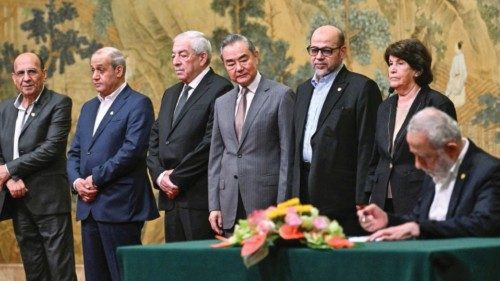 China's Foreign Minister Wang Yi looks on during the signing of the 'Beijing declaration' at the ... China's Foreign Minister Wang Yi looks on during the signing of the 'Beijing declaration' at the ...