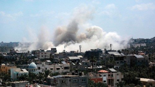 Smoke rises during an Israeli strike in Deir el-Balah in the central Gaza Strip on July 27, 2024, ... Smoke rises during an Israeli strike in Deir el-Balah in the central Gaza Strip on July 27, 2024, ...