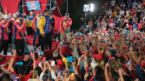 Venezuelan President and presidential candidate Nicolas Maduro reacts in front of his supporters ... Venezuelan President and presidential candidate Nicolas Maduro reacts in front of his supporters ...