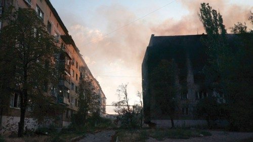 This photograph shows an apartment building burning after shelling in the town of Toretsk, Donetsk ... This photograph shows an apartment building burning after shelling in the town of Toretsk, Donetsk ...