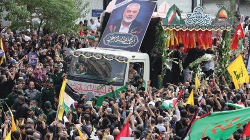 epaselect epa11514508 People gather around a truck carrying the coffins of Hamas late political ... epaselect epa11514508 People gather around a truck carrying the coffins of Hamas late political ...