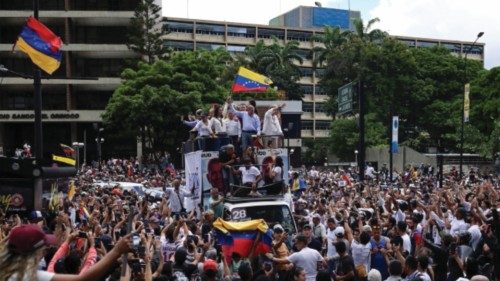 Opposition leader Maria Corina Machado and opposition candidate Edmundo Gonzalez wave as they ... Opposition leader Maria Corina Machado and opposition candidate Edmundo Gonzalez wave as they ...