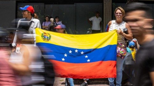 epa11523564 Two women hold a Venezuelan flag during a protest called by the Venezuelan opposition ... epa11523564 Two women hold a Venezuelan flag during a protest called by the Venezuelan opposition ...