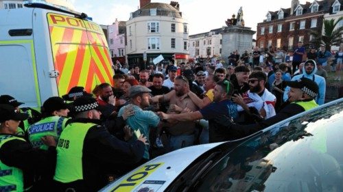 Police officers face off with protesters during a 'Enough is Enough' demonstration called by ... Police officers face off with protesters during a 'Enough is Enough' demonstration called by ...