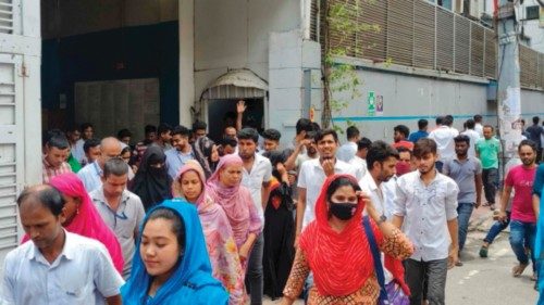 Garment factory workers break for lunch, in Dhaka on August 7, 2024, after former prime minister ... Garment factory workers break for lunch, in Dhaka on August 7, 2024, after former prime minister ...
