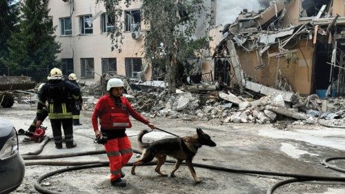 Rescuers work at the site of a Russian missile strike, amid Russia's attack on Ukraine, in Kharkiv, ... Rescuers work at the site of a Russian missile strike, amid Russia's attack on Ukraine, in Kharkiv, ...