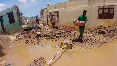 People save things from a destroyed house following heavy rains in Abu Hamad, in Sudan's River Nile ... People save things from a destroyed house following heavy rains in Abu Hamad, in Sudan's River Nile ...