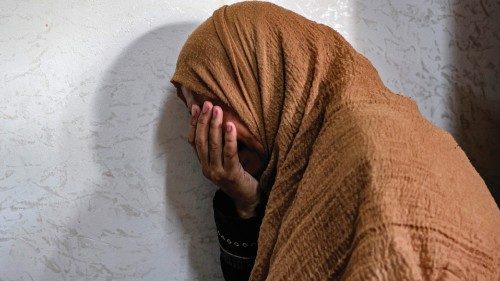 TOPSHOT - A relative mourns during the funeral of Palestinian Anas Anshasi, 22, after he succumbed ... TOPSHOT - A relative mourns during the funeral of Palestinian Anas Anshasi, 22, after he succumbed ...