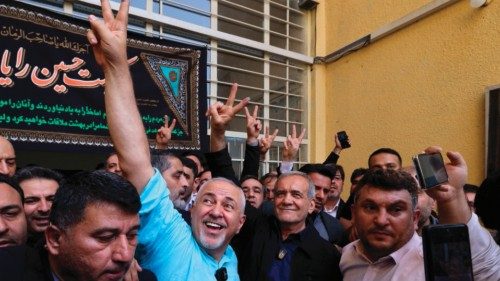 (FILES) Iranian reformist candidate Masoud Pezeshkian (C-R) and Iran's former foreign minister ... (FILES) Iranian reformist candidate Masoud Pezeshkian (C-R) and Iran's former foreign minister ...