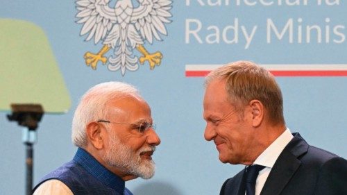 Polish Prime Minister Donald Tusk (R) and Indian Prime Minister Narendra Modi shake hands after ... Polish Prime Minister Donald Tusk (R) and Indian Prime Minister Narendra Modi shake hands after ...