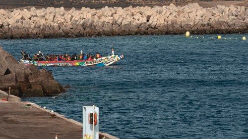 A boat from Senegal, with 85 migrant people on board, enters the harbour's cove at La Restinga port, ... A boat from Senegal, with 85 migrant people on board, enters the harbour's cove at La Restinga port, ...