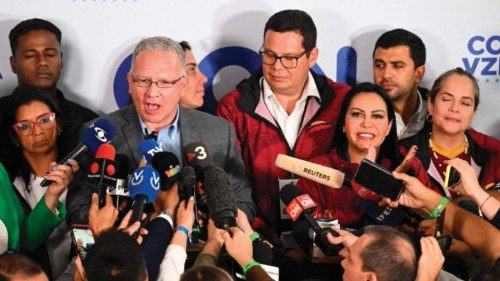 (FILES) Perkins Rocha, legal advisor of the opposition party Vente Venezuela, talks to the media as ...