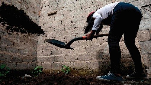 A woman member of the collective Guerreros Buscadores works searching for their missing relatives ... A woman member of the collective Guerreros Buscadores works searching for their missing relatives ...