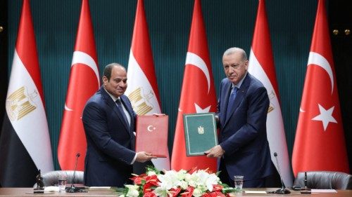 TOPSHOT - This handout photograph taken and released by Turkish Presidency Press Office on September ... TOPSHOT - This handout photograph taken and released by Turkish Presidency Press Office on September ...