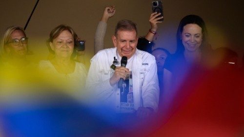 (FILES) Venezuelan presidential candidate Edmundo Gonzalez (C) speaks to students next to his wife ... (FILES) Venezuelan presidential candidate Edmundo Gonzalez (C) speaks to students next to his wife ...
