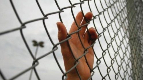 An inmate serving a jail sentence rests his hand on a fence. REUTERS/Joshua Lott An inmate serving a jail sentence rests his hand on a fence. REUTERS/Joshua Lott