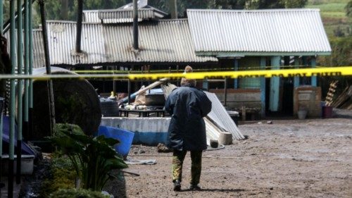 epa11588924 A person walks at a cordoned off area in the courtyard of the Hillside Endarasha Primary ...