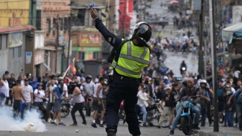 (FILES) (FILES) A riot police officer uses tear gas against demonstrators during a protest by ... (FILES) (FILES) A riot police officer uses tear gas against demonstrators during a protest by ...
