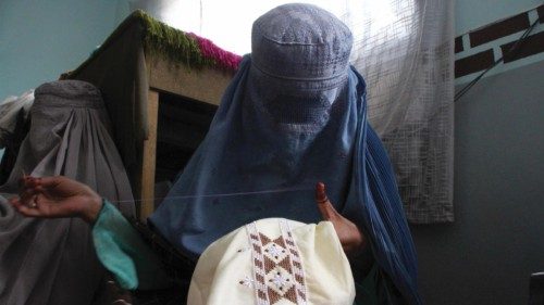 epa11584431 An Afghan woman stitches clothes at a workshop in Kandahar, Afghanistan, 04 September ... epa11584431 An Afghan woman stitches clothes at a workshop in Kandahar, Afghanistan, 04 September ...