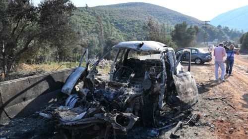 Syrians inspect the damage at the site of overnight Israeli strikes on the outskirts of Masyaf in ... Syrians inspect the damage at the site of overnight Israeli strikes on the outskirts of Masyaf in ...