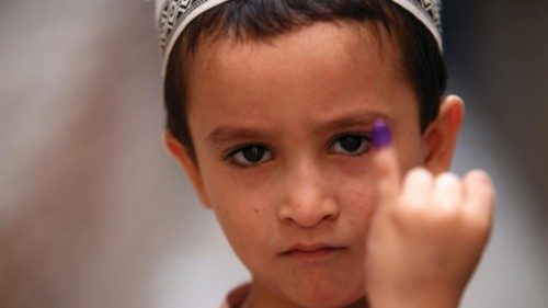 epa11594240 A child shows a marked finger after they were administered polio vaccine drops by a ... epa11594240 A child shows a marked finger after they were administered polio vaccine drops by a ...