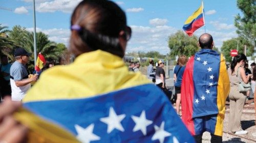 Supporters wrapped in Venezuelan flags gather upon the arrival of Venezuelan opposition presidential ... Supporters wrapped in Venezuelan flags gather upon the arrival of Venezuelan opposition presidential ...
