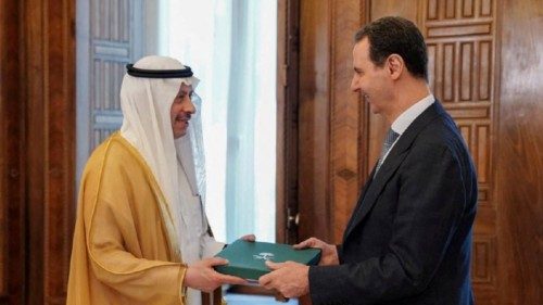 FILE PHOTO: Syria's President Bashar al-Assad receives an invitation from Saudi Arabia's King Salman ... FILE PHOTO: Syria's President Bashar al-Assad receives an invitation from Saudi Arabia's King Salman ...