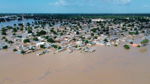 This aerial view shows houses submerged under water in Maiduguri on September 10, 2024. Flood water ... This aerial view shows houses submerged under water in Maiduguri on September 10, 2024. Flood water ...